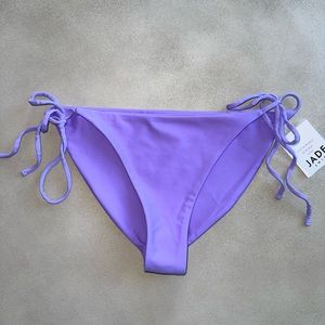JADE SWIM Side Tie Bikini Bottoms In Lavender